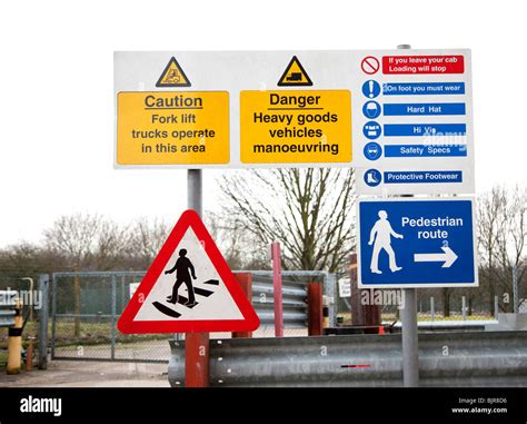 Factory Safety Warning Signs In The Uk Stock Photo Alamy
