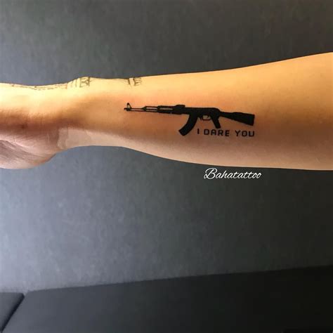 Pin On Arm Tattoo