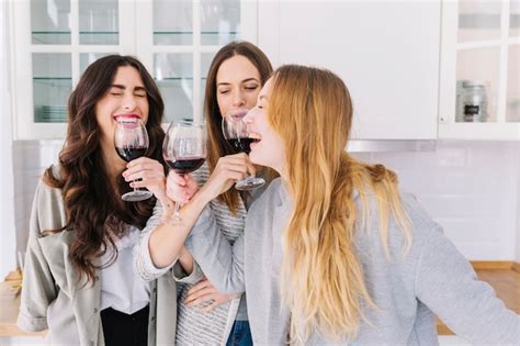 Laughing Women Drinking Wine Free Photo