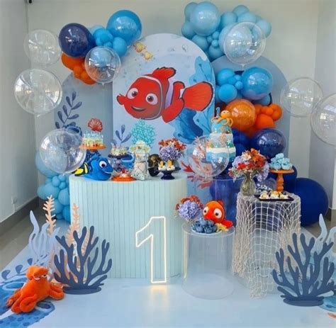 An Under The Sea Themed Birthday Party With Balloons And Decorations