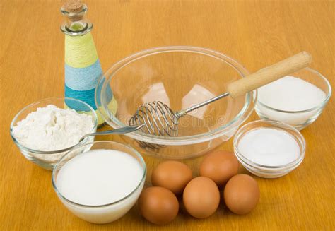 Flour Salt Sugar Flour Eggs Oil Bottle And Utensils Stock Photo
