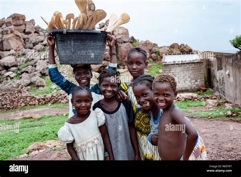 Mali Africa Black Children Carrying Food In An African Village Near Bamako Stock Photo Alamy