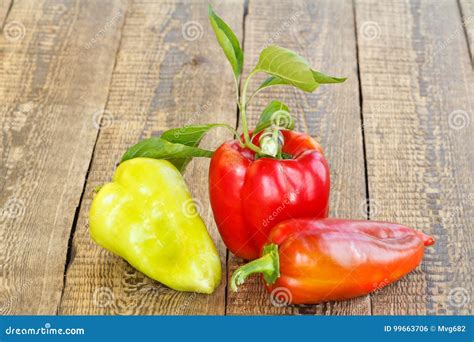 Ripe Red And Yellow Bell Peppers On Wooden Boards Bulgarian Or Stock