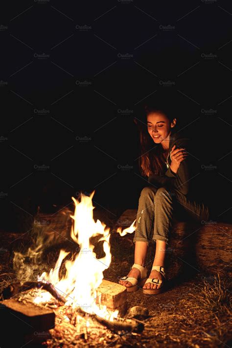 Girl At Night Near The Campfire