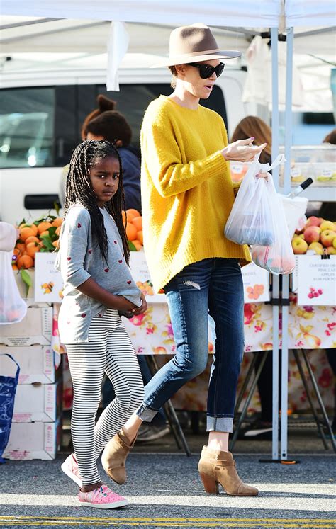This material must not be used for commercial purposes, or in any hospital or medical facil. Charlize and son Jackson Theron are seen out and about