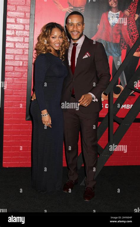 Meagan Good And Devon Franklin Attending The Annie Premiere Held At