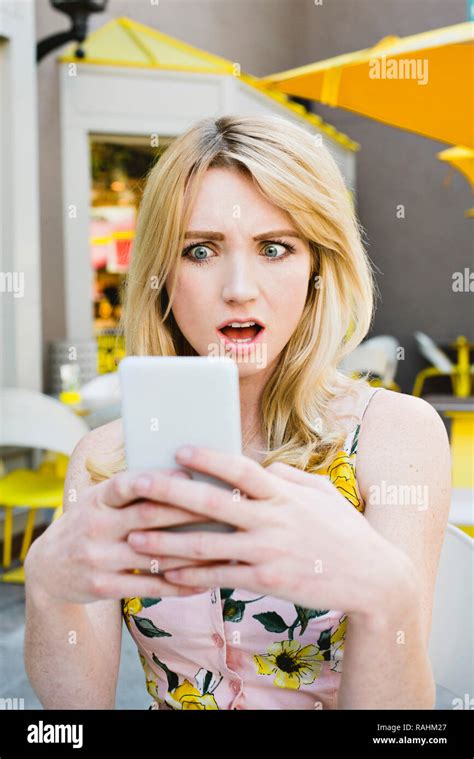 Shocked Woman Looking Mobile Phone Hi Res Stock Photography And Images