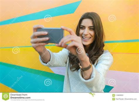 woman happy taking selfie photos outdoor in the city stock image image of clothes adult