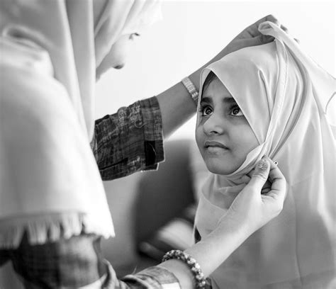 Free Royalty Image About Muslim Mom Teaching Daughter How To Wear A
