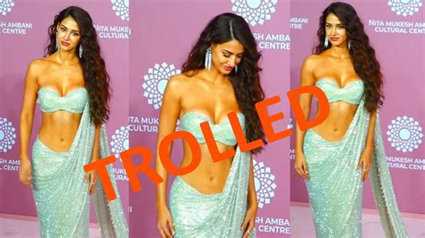 trolled disha patani flaunts her abs in a tiny glittery strapless blouse with shimmery saree