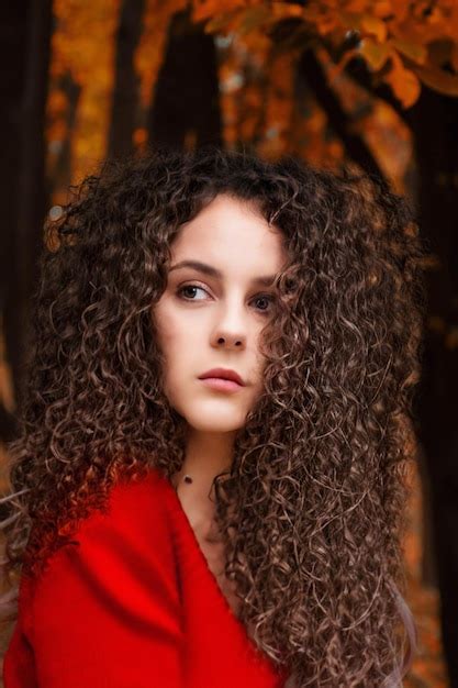 Premium Photo Close Up Of A Curly Haired Girls Face