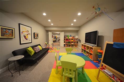Eclectic kids room with table and chairs. Basement Kids Playroom Ideas| Basement Masters