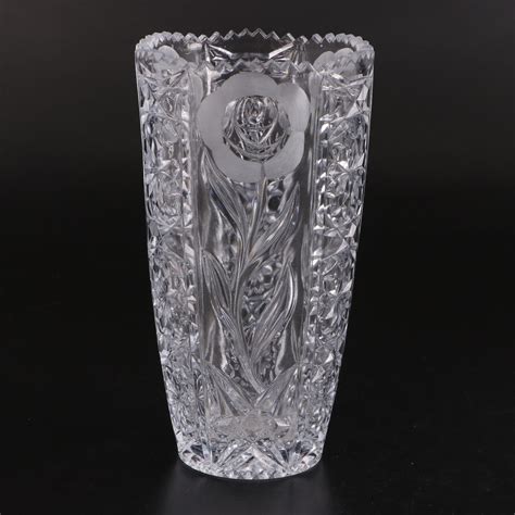 American Brilliant Style Pinwheel Cut Crystal Vase And Floral Pressed Glass Vase Ebth