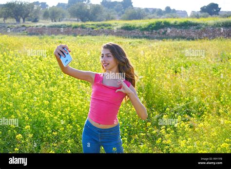 Teen Girl Selfie Video Photo In Spring Meadow Stock Photo Alamy
