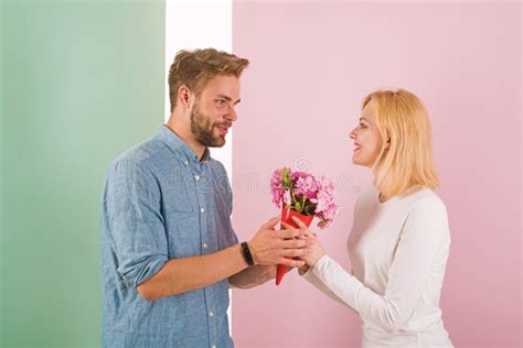 Man Congratulates Woman Birthday Anniversary Holiday Pastel Background T Concept Man Gives