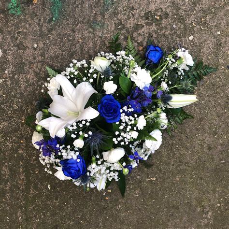 Blue And White Single Ended Spray Funeral Flowers Tribute Wreath