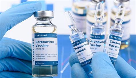 What share of the population has received at least one dose of the. COVID-19 Vaccine Will Be Ready By Year End In 'Best Case ...