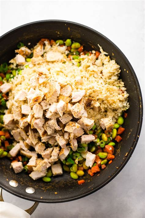 To make riced cauliflower in a food processor, add florets to the bowl and then top with cold water. 25 Minute Chicken Cauliflower Fried Rice • A Sweet Pea Chef