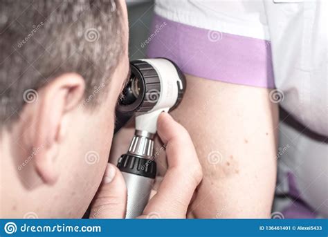 Oncologist Performs Dermatoscopy To The Patient Stock Image - Image of performs, dermatologist 