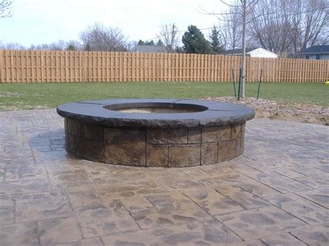 Finally, once your outdoor natural gas fire pit is installed, be sure to keep a fire extinguisher or water source nearby whenever it's lit—properly maintained fire pits are generally dive into your options for brick and concrete fire pits, and take the first step toward creating a cozy backyard gathering place. Photo Gallery - Outdoor Fire Pits - East Leroy, MI - The Concrete Network