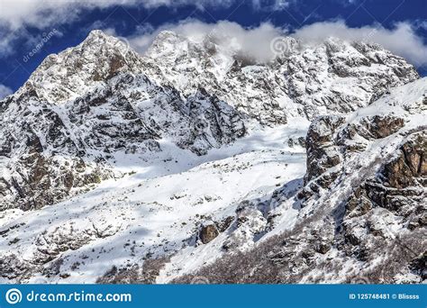 Beautiful Scenic Landscape Of Rocky Snow Covered Mountain Peaks Of