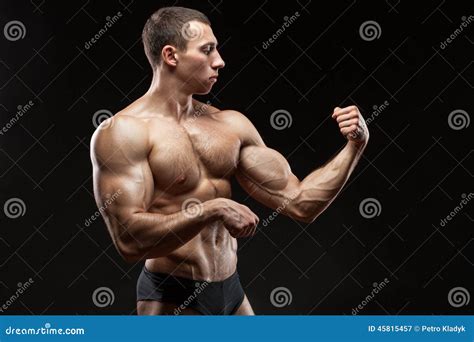 Bodybuilder Demonstrates Large Biceps Stock Image Image Of Body