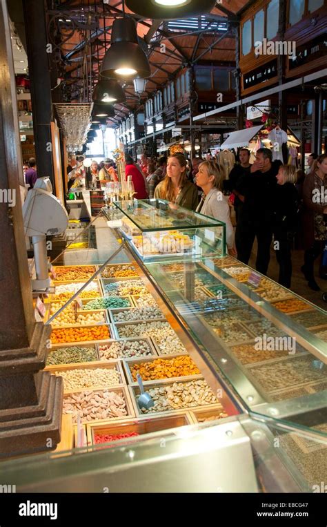 People At Dried Fruit And Nuts Shop San Miguel Market Madrid Spain