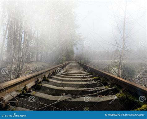 Abandoned Rusty Rail Track In The Fog Railroad Tracks In The Forest