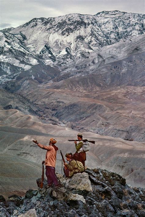 3 Afghan Taliban Mujahideen Fighters Stand Atop A Mountain Of Hindu