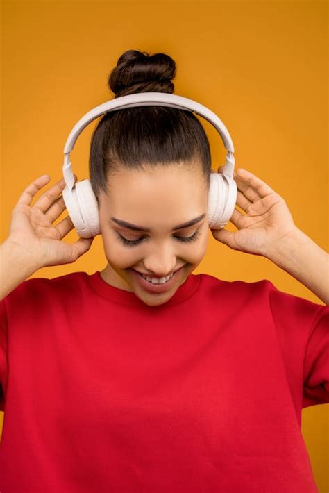 Smiling Woman With Headphones · Free Stock Photo