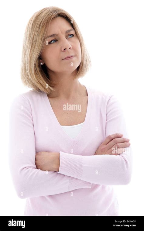 Pensive Woman Standing With Folded Arms Stock Photo Alamy