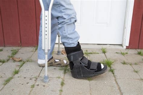 How To Wear A Walking Boot And Use Crutches