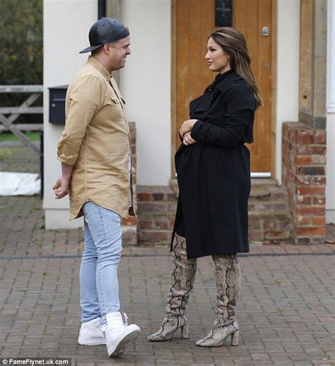 Sam Faiers Showcases Her Growing Baby Bump In Black Wrap Coat Daily