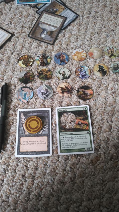 We talked to a guy who makes his living when a player goes to a tournament to play magic: OC Making quality tokens from old Magic cards : DnD