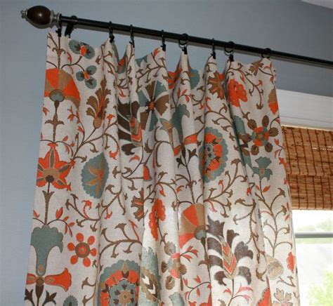 Curtains are a pleasant alternative to venetian or roller blinds more subtle shades including rich terracotta, can work perfectly to create a classic look in your bedroom and living room. circle curtain panels in orange and blue | Suzani Designer ...