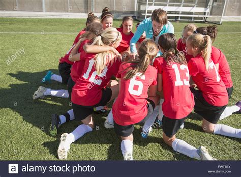 Coach Talking With Girls Soccer Team In Huddle Stock Photo Alamy