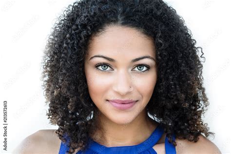 Beautiful Young Blue Eyed African American Woman With Curly Hair Stock