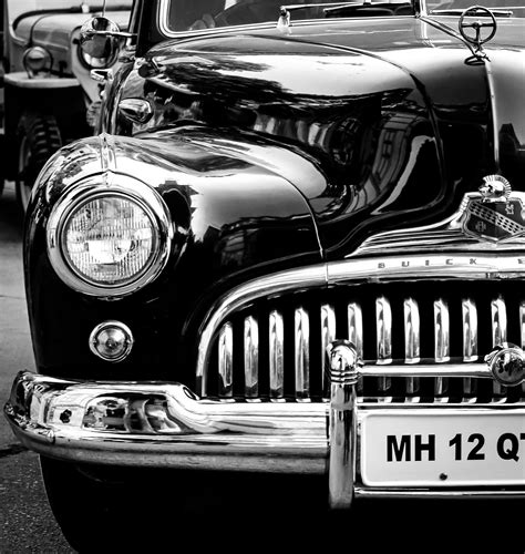 Download A Timeless Beauty Black And White Vintage Car Wallpaper
