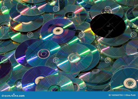 A Pile Of Shiny Cds And Dvds Editorial Image Image Of Design Discs 165565755