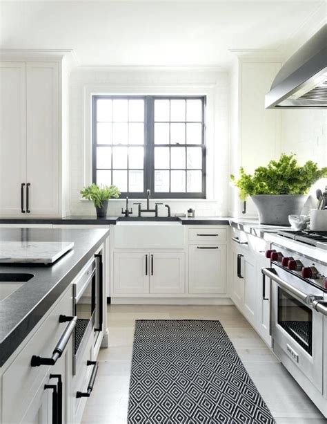 Paired with the right hardware and color: Image result for black hardware white shaker cabinets | White cottage kitchens, Cottage kitchens ...
