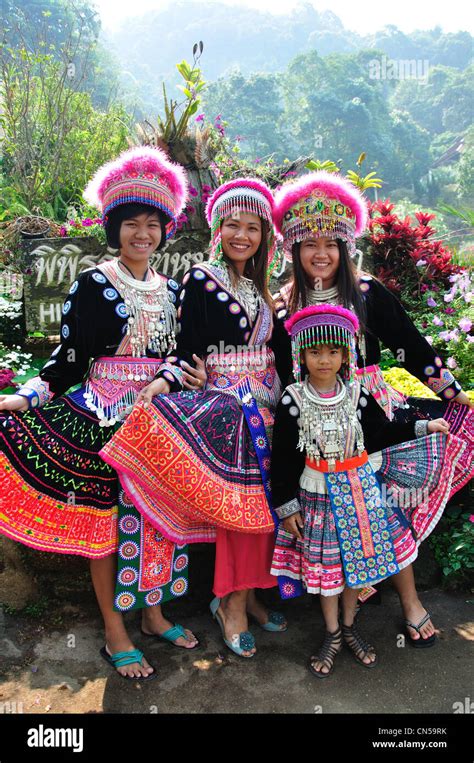 Akha Hill Tribe Group In Traditional Dress At Village Museum And Gardens Near Chiang Mai