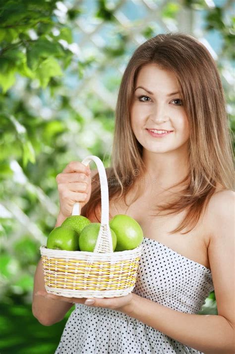 Girl With Apples In The Garden Stock Image Image Of Adult Basket 23667709