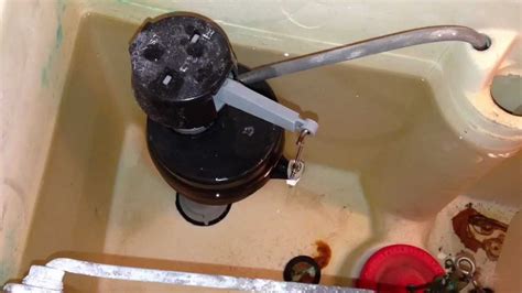 Adjusting toilet float to save $ - YouTube