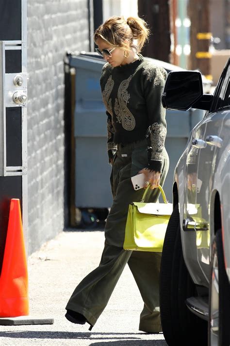 Jennifer Lopez Wears A Stylish Green Ensemble While Out Running Errands