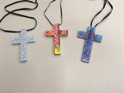 Painted Wooden Crosses Out Upon The Waters
