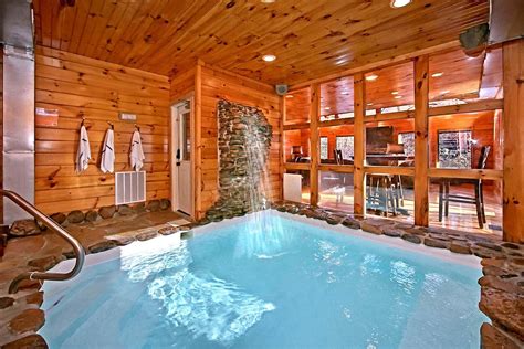 Guests can cozy up inside or on the por. 2 Bedroom Cabins in Gatlinburg, TN for Rent Elk Springs Resort