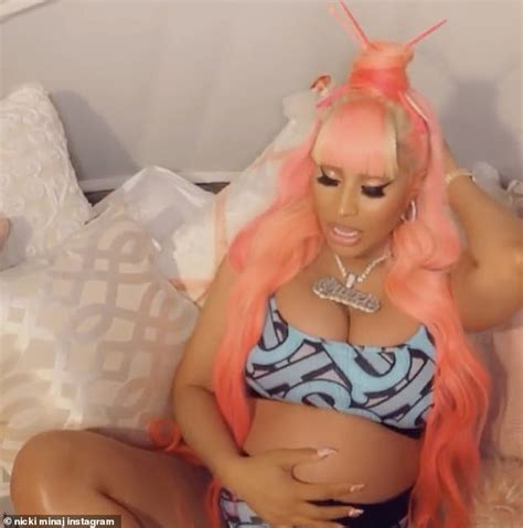 Pregnant Nicki Minaj Flaunts Her Growing Baby Bump In Burberry Bikini