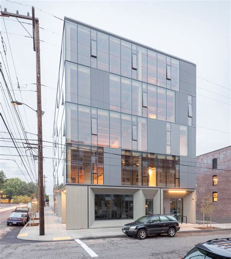 Glass Facade Reveals Timber Structure Of Portland Office Building