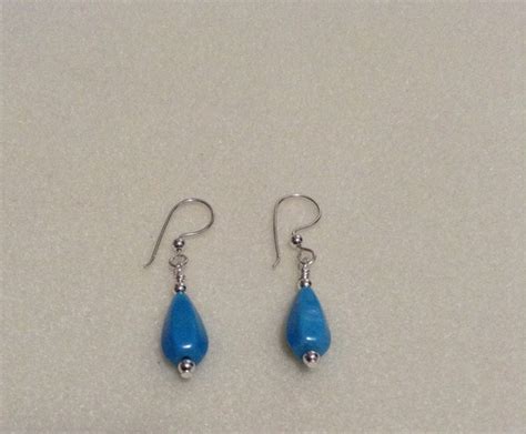 Turquoise Teardrop And Sterling Silver Earrings ESS