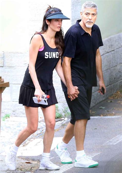 George And Amal Clooney Hold Hands After Playing Tennis Us Weekly